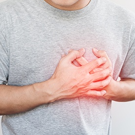 Man in gray t-shirt with poor heart health